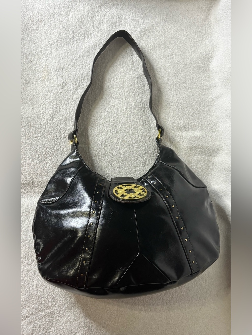 Black Patent Shoulder Hobo Bag with Gold Medallion Accent